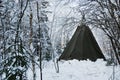 indian tepee in the winter forest