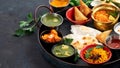 Indian Thali on dark background Royalty Free Stock Photo