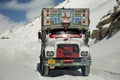 Indian and tibetan drive car and truck on Khardung La Road in Himalaya mountain at Leh Ladakh in Jammu and Kashmir, India