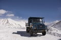 Indian and tibetan drive car and truck on Khardung La Road in Himalaya mountain at Leh Ladakh in Jammu and Kashmir, India