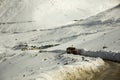 Indian and tibetan drive car and truck on Khardung La Road in Himalaya mountain at Leh Ladakh in Jammu and Kashmir, India