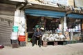 Tibetan grocery sit and sale product in bazaar or market Leh Ladakh village at Himalayan valley in Jammu and Kashmir, India Royalty Free Stock Photo