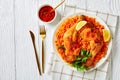 Indian tomato rice with roasted chicken quarters