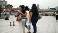 Indian tourist taking photo with Marina Bay Sands and cityscape Royalty Free Stock Photo