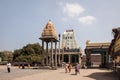 Indian tourists explore ancinet temples of the Five Rathas