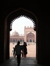 Indian tourists explore the courtyard and palaces