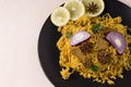 Biryani with chicken. Traditional Indian dish of rice and chicken, with spices and lemon. Royalty Free Stock Photo