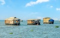 Indian traditional floating houseboats homes on Pamba river backwaters, Alappuzha, Kerala, South India Royalty Free Stock Photo