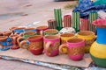 Indian traditional handmade clay potsisolated on blurred background are displayed in a street shop for sale. Indian handicraft and