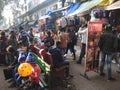 Indian Road side market peaple Sitting Sarojini Nagar Delhi Royalty Free Stock Photo