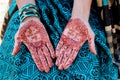 Indian traditional mehndi design on women's hands