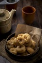 Indian traditional sweet balushahi served on a metal plate on wooden background Royalty Free Stock Photo