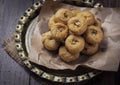 Indian traditional sweet balushahi served on a metal plate on wooden background Royalty Free Stock Photo