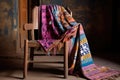 indian traditional textiles draped over a childs chair