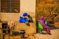 Indian two women near his home.Pushkar. India. Royalty Free Stock Photo