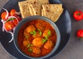 Indian Kashmiri dum aloo or potato curry and roti meal