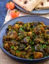Indian vegan aubergine curry with roti
