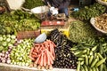 Indian Vegetable and Herb Trader at Grocery Market