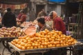 Indian Vegetable and Herb Trader at Grocery Market