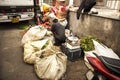 Indian Vegetable and Herb Trader at Grocery Market