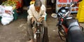 an indian village blacksmith sharpen knife in the market in india oct 2019