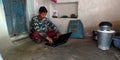 An indian village boy operating laptop computer system seating at room Royalty Free Stock Photo