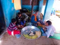 Indian village cooks making floar meal for occasion at home in india dec 2019 Royalty Free Stock Photo