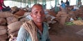 An indian village farmer smile during work at agriculture produce market