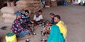 Indian village farmers having lunch at agriculture produce market government authorized food corporation center in India Royalty Free Stock Photo
