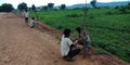 Indian village farmers protecting agriculture field from throne wire for animals protection