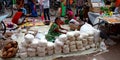 an indian village female selling devotional food during diwali festival in India Oct 2019