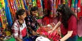 indian village girls buying traditional outfits during festival season in India Royalty Free Stock Photo