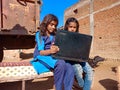 indian village government school girl operating laptop computer system at rural area in india January 2020