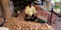 an indian village greengrocer seating insight the potatoes stor Royalty Free Stock Photo