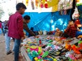indian village kids buying toys at street shop in india January 2020 Royalty Free Stock Photo