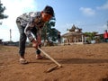 indian village kids playing Gilli danda at India January 1, 2020 Royalty Free Stock Photo