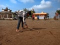 indian village kids playing Gilli danda at India January 1, 2020