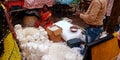 An indian village lady selling devotional food during diwali festival at market in India Oct 2019