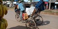 An indian village rickshaw rider on street transportation