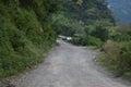 Indian village road between forest