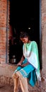 An indian village teen using smart phone