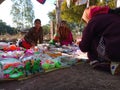 an indian village woman looking toys from street shop during fair program in India January 2020 Royalty Free Stock Photo