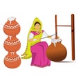 Indian Village woman making butter with bilona