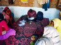 indian village women repaying loan installment at self help group center in India January 2020