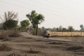 Indian villagers going to collecting water from near by pond but there is one difference between these two which is one who have Royalty Free Stock Photo