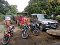 Indian villagers having cars n bikes collection