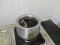 Indian villages redtea in home creat at gas stove