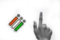 Indian Voter Hand with voting sign and ink pointing vote for India behind on election commission of India background