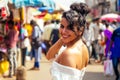 Indian wearing fashionable clothes posing in asian bazar