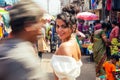 Indian wearing fashionable clothes posing in asian bazar